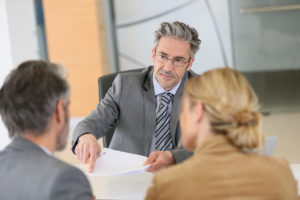 Couple meeting with divorce attorney